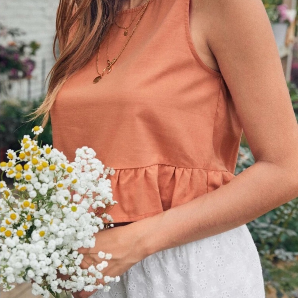 Sleeveless Orange Peplum Top